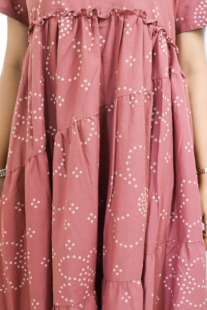 Janani - Pink bandhani maxi with cross-tiers