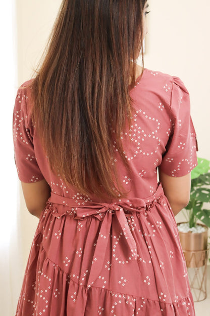 Janani - Pink bandhani maxi with cross-tiers