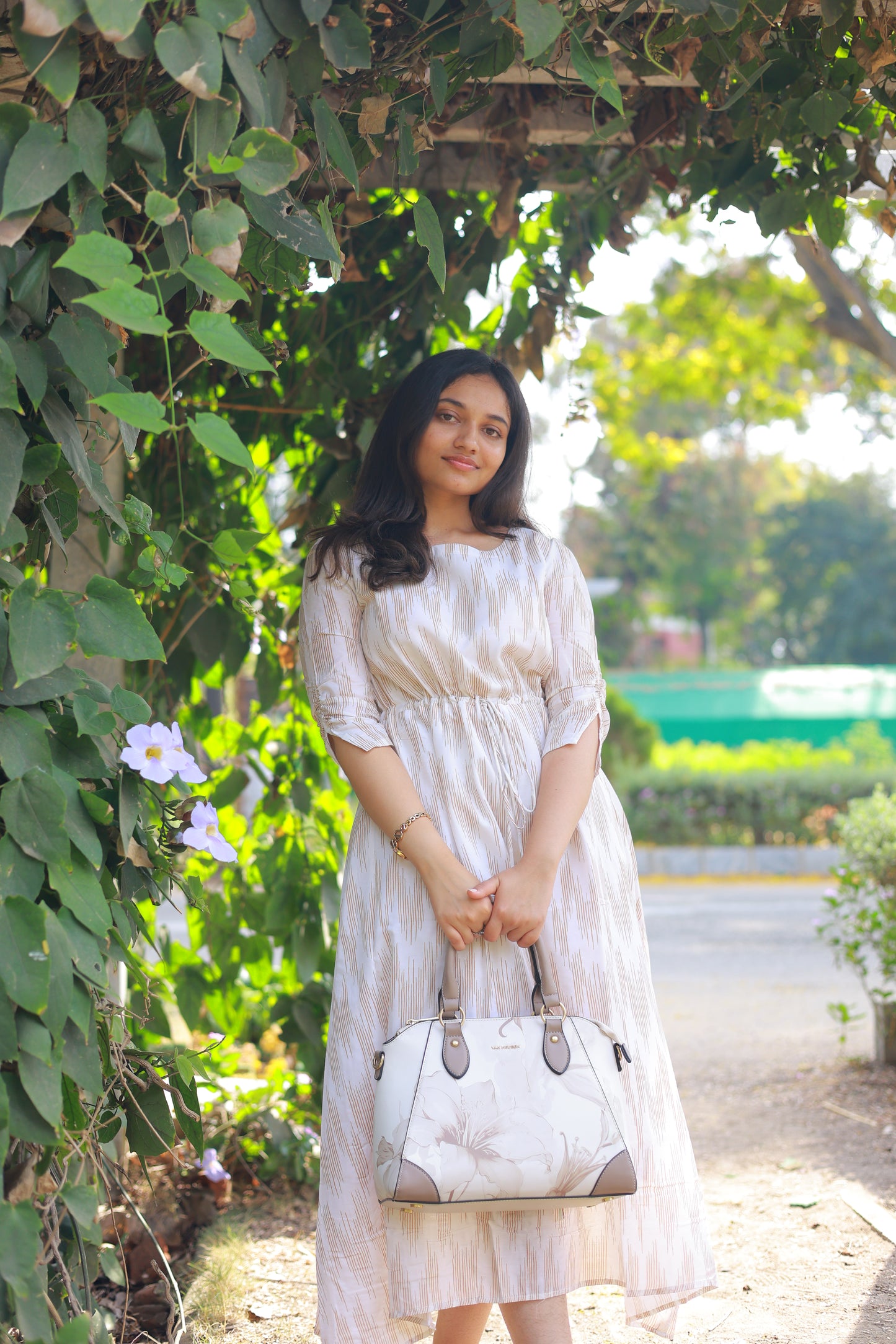 Muslin ikkat print flared maxi with waist tie